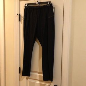 Poly knit pants with faux leather trim on front and back
